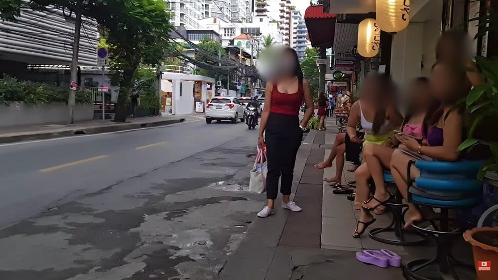 Girls Outside Massage Parlor in Thailand